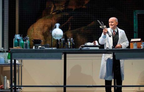 Anthony Pilavachi’s stage direction of Siegfried at Theater Lübeck (2009) shows Mime as a laboratory scientist. Photo: Jörg Metzner Anthony Pilavachi's stage direction of Siegfried at Theater Lübeck (2009) shows Mime as a laboratory scientist. Photo: Jörg Metzner